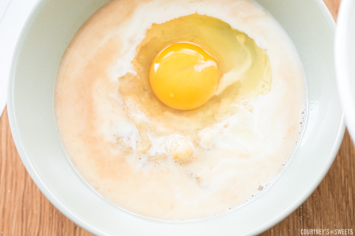 wet ingredients and egg in a bowl