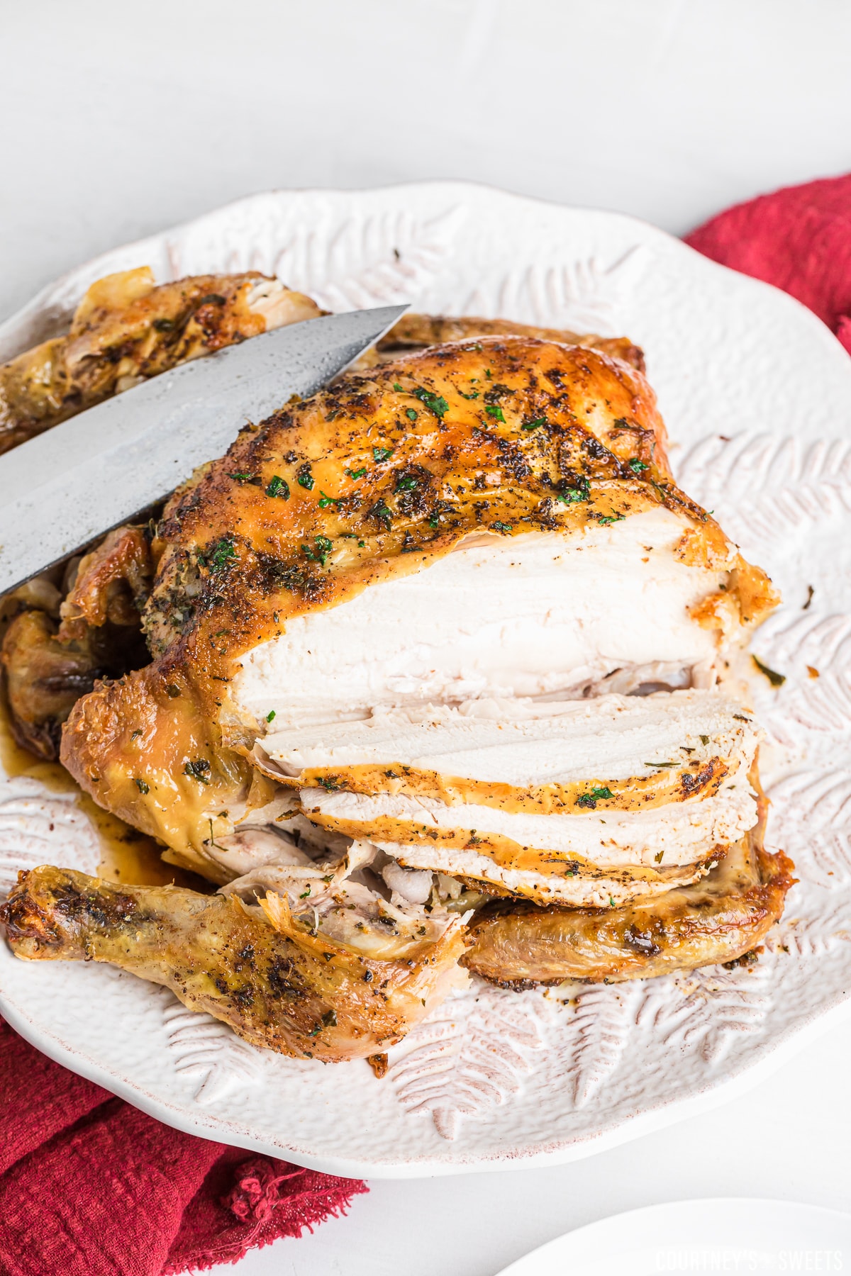 air fryer chicken sliced on a platter.