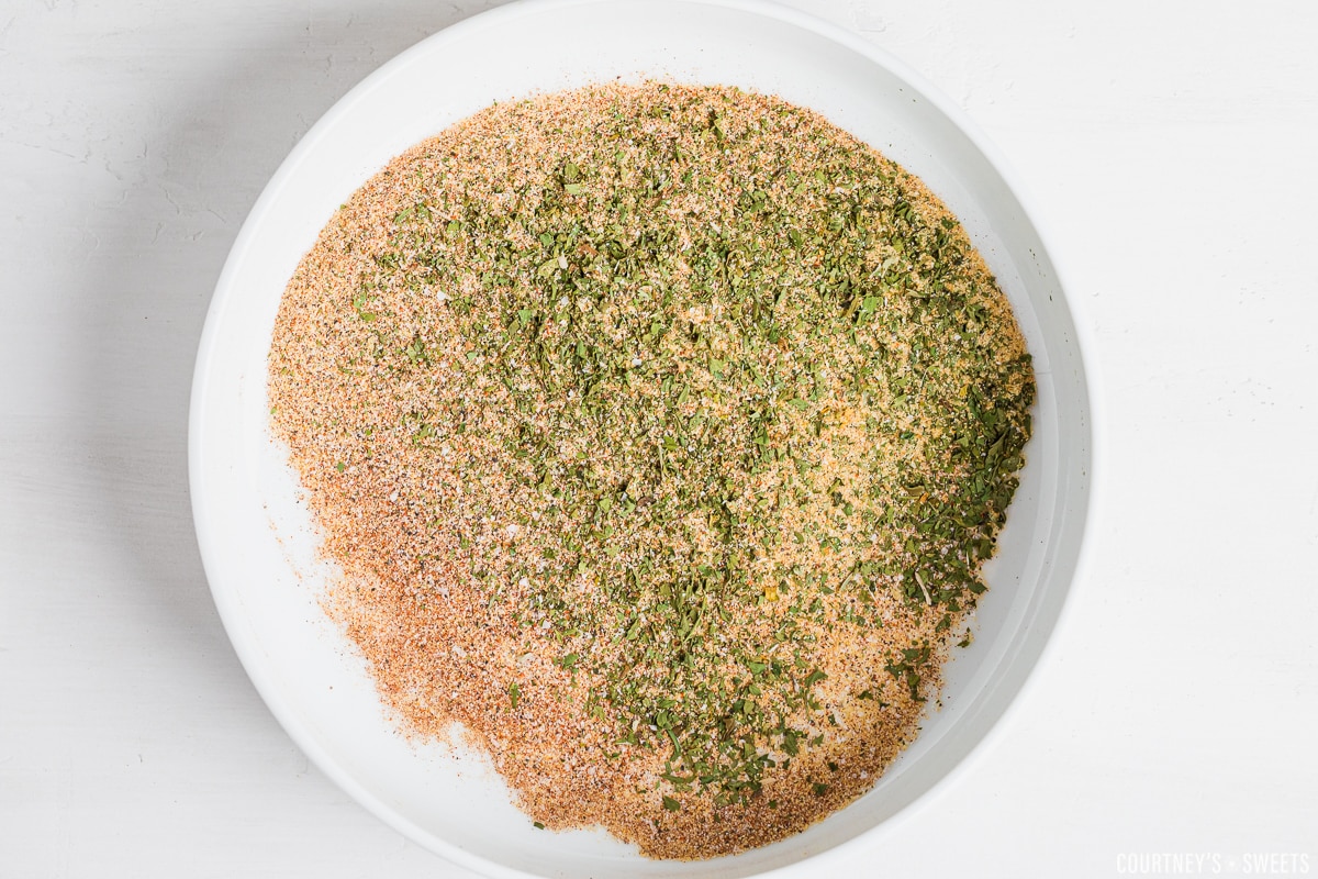 mixed chicken seasoning blend in a white bowl.