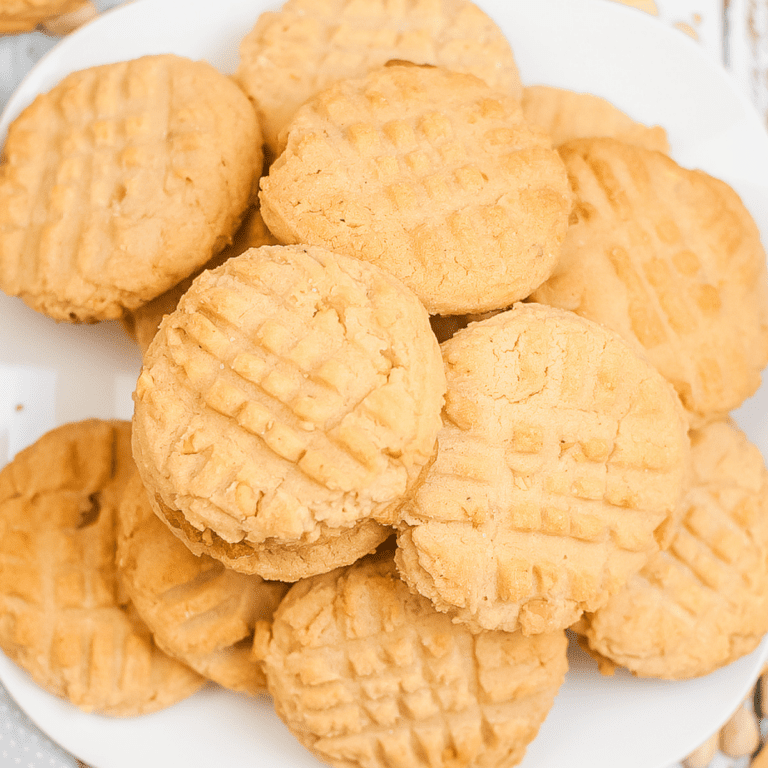 air fryer peanut butter cookies on a white plate.