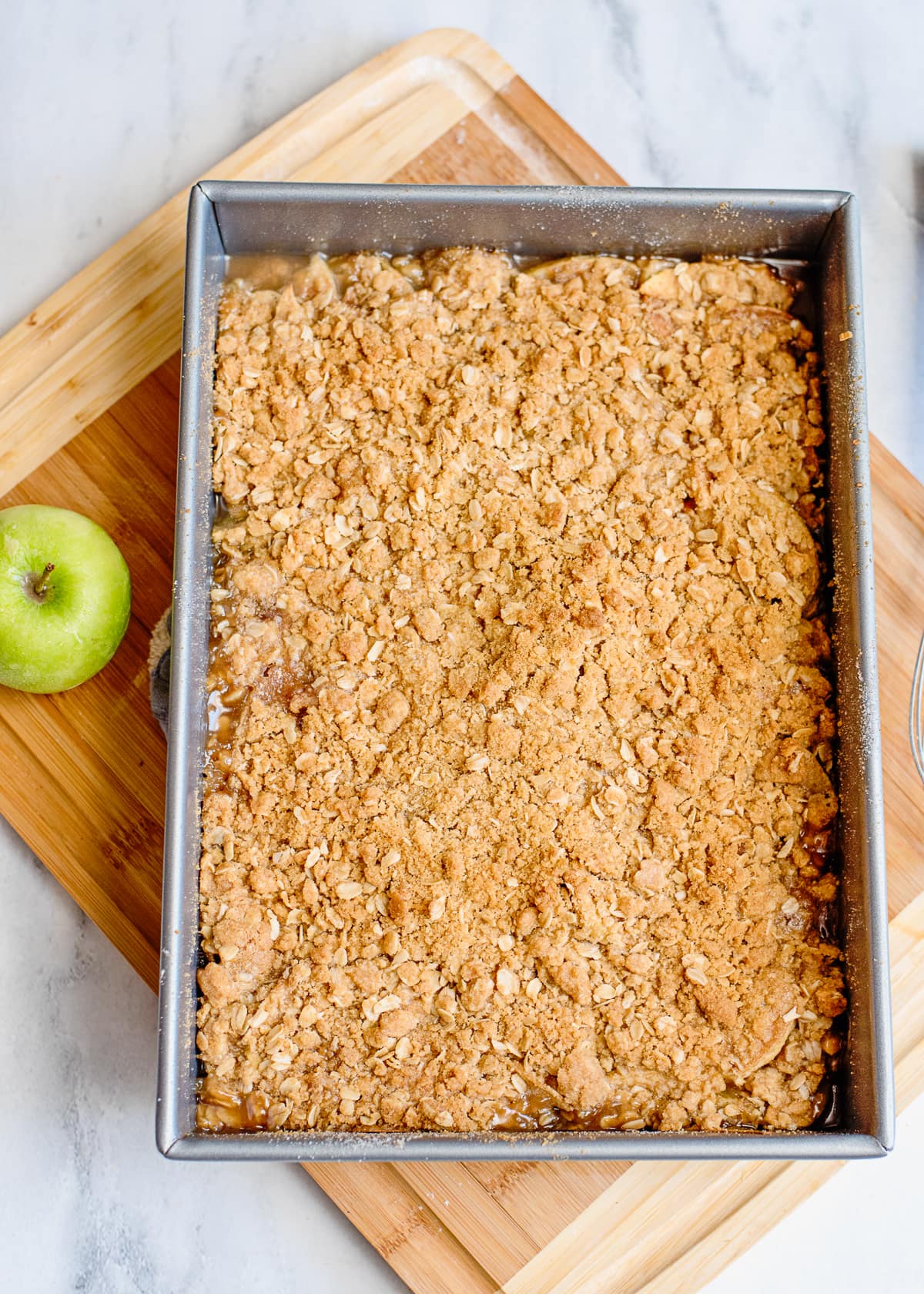 cooked apple crisp in a baking dish.