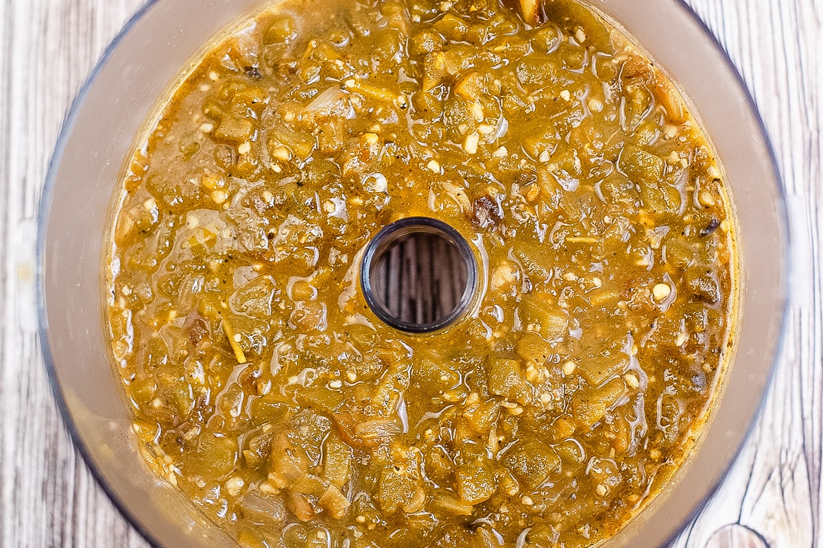 green enchilada sauce ready to puree in a food processor.