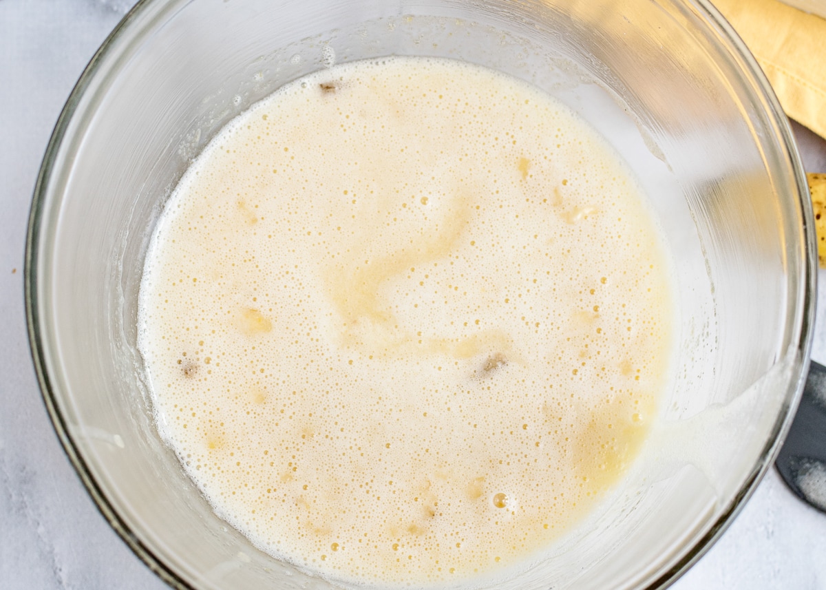 wet mixture for cake mixed in a bowl.