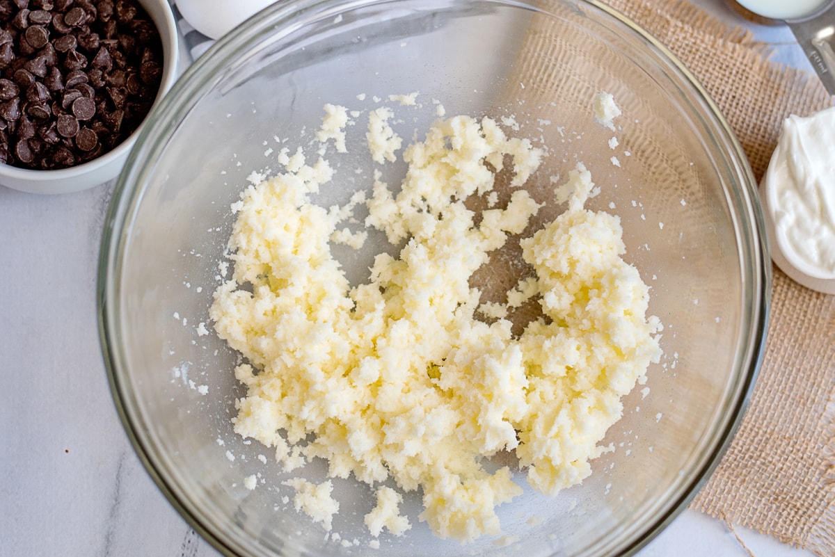 creamed butter and sugar in a glass dish.