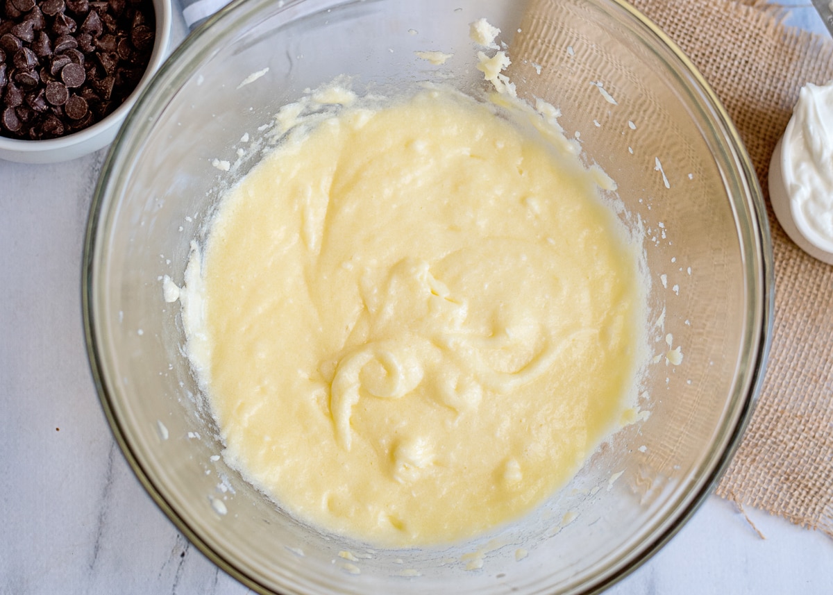 wet ingredients for cake in a glass bowl.