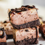 chocolate and vanilla cream cheese brownie bars stacked
