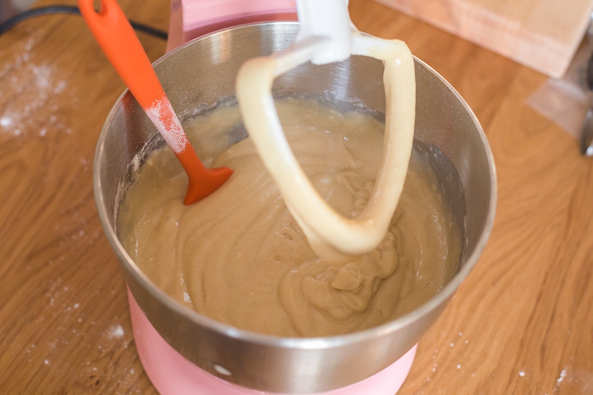 cupcake batter in a stand mixer bowl.