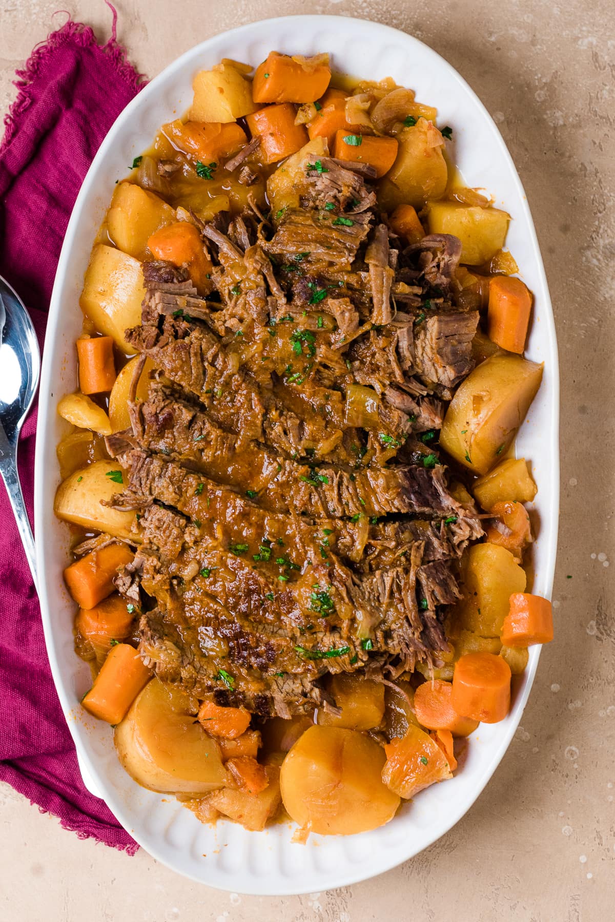 overhead photo of instant pot brisket with potatoes and carrots.