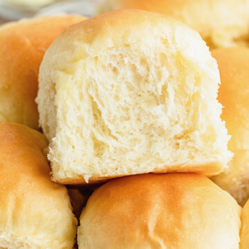 dinner rolls stacked on top of each other.