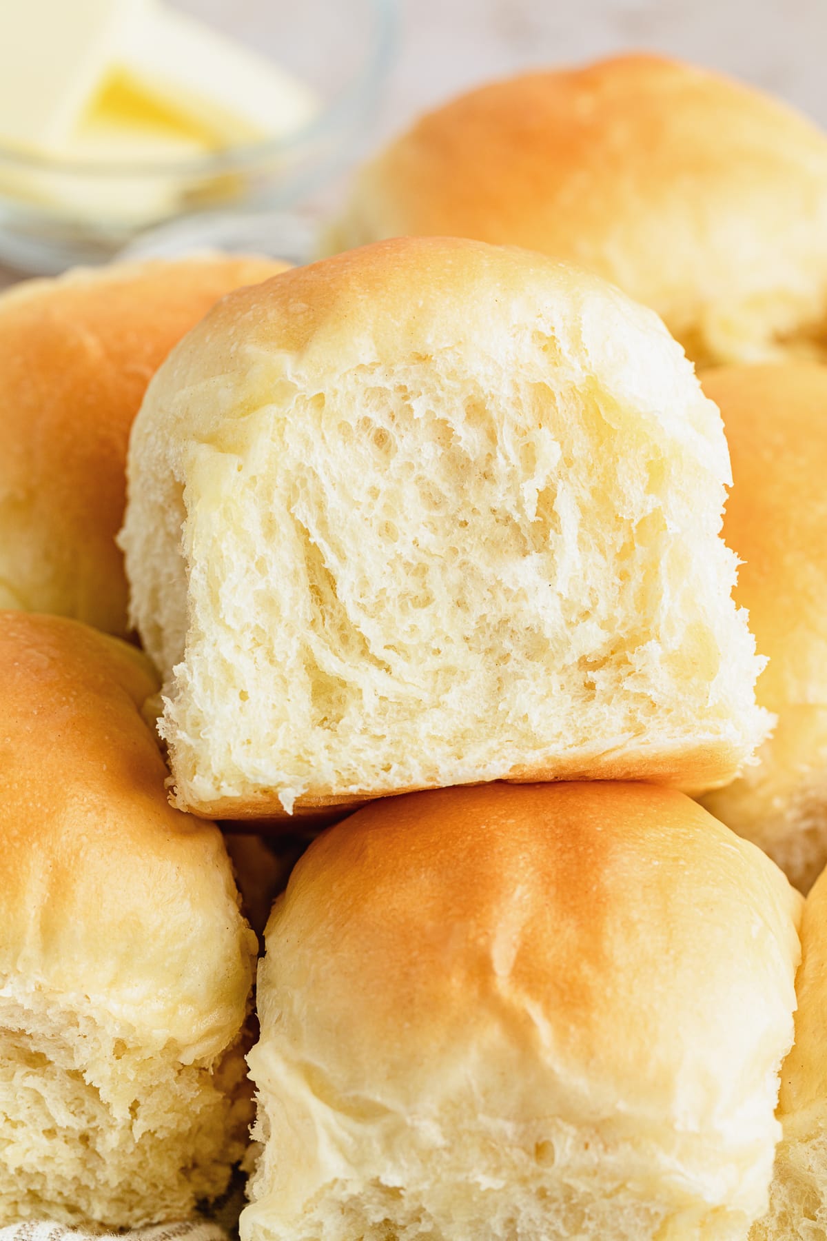 dinner rolls stacked on top of each other.