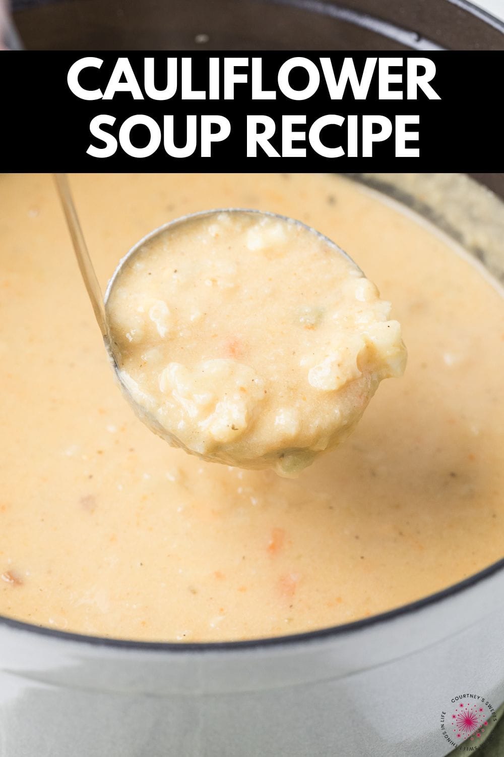 cauliflower soup in a ladle with text on image saying cauliflower soup recipe.