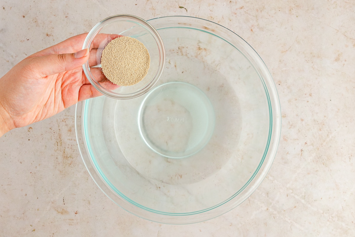 adding yeast to water.