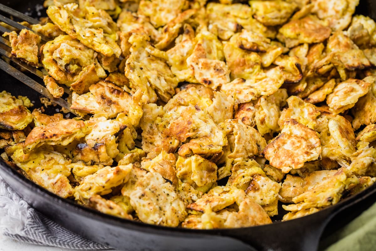 breakfast matzo brei in a cast iron skillet.