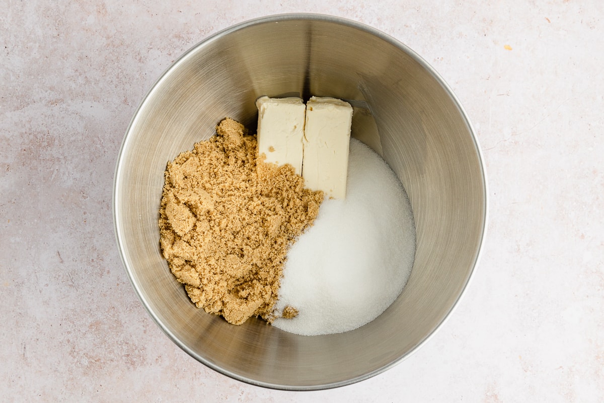 butter and sugars in mixing bowl.