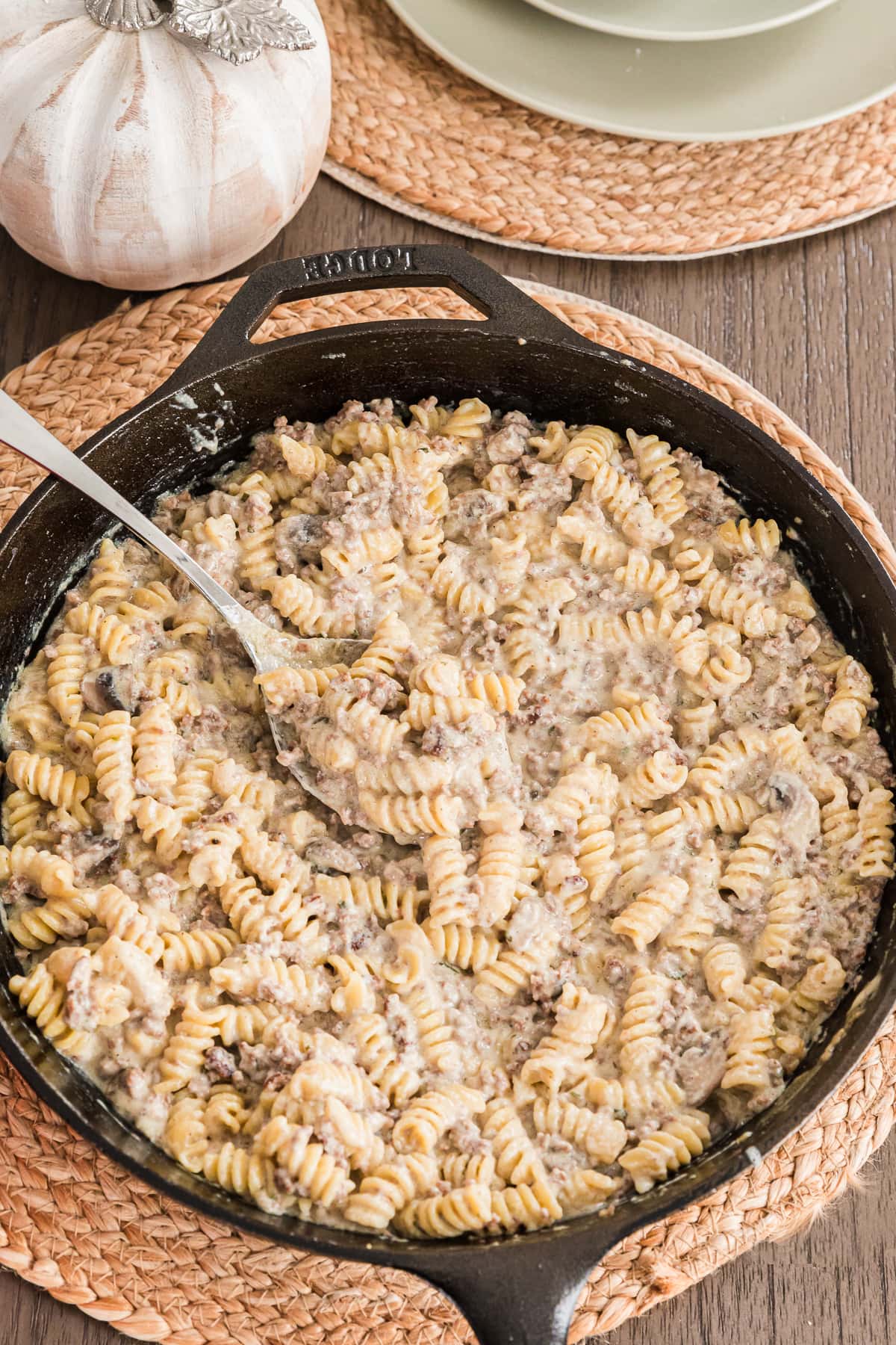 dairy free beef stroganoff in a cast iron skillet on a table.