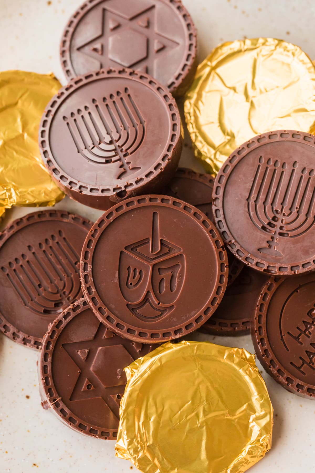 homemade Hanukkah gelt with dreidel menorah star of david.