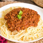 homemade spaghetti sauce over thin spaghetti.
