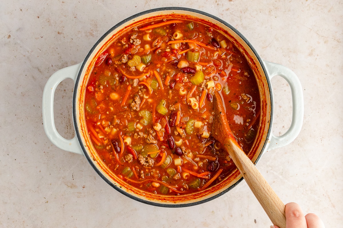 Pasta e Fagioli Soup in a pot with a spoon.