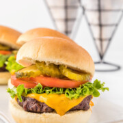 hamburger with cheese and toppings.