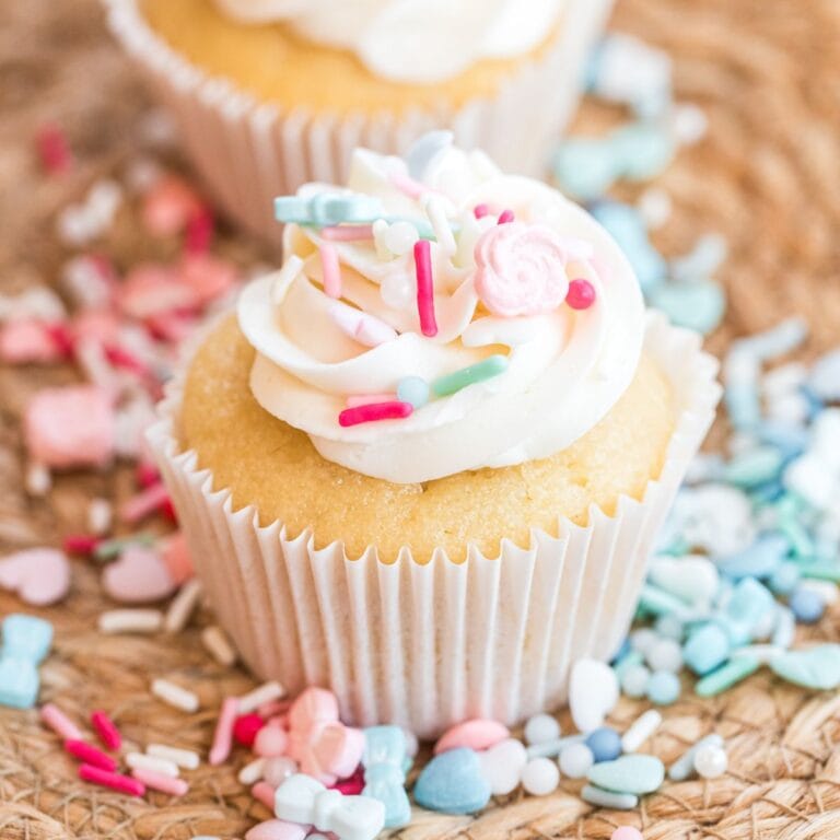 gender reveal cupcakes with blue and pink sprinkles.