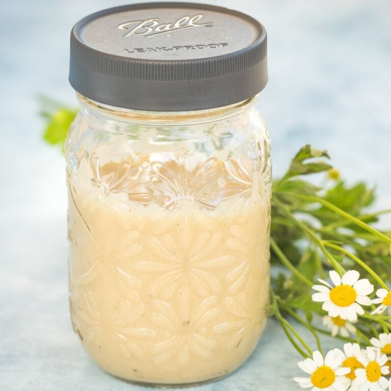condensed cream of chicken soup in a glass mason jar.