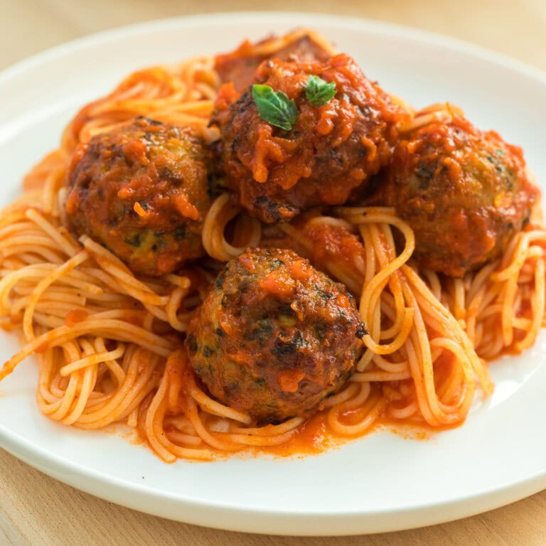 baked chicken meatballs with spaghetti.