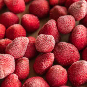 how to freeze strawberries, frozen strawberries on sheet pan.