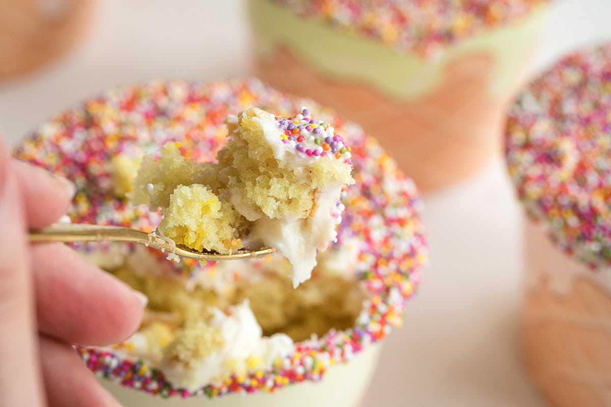 bite of nonpareils, buttercream and cake.