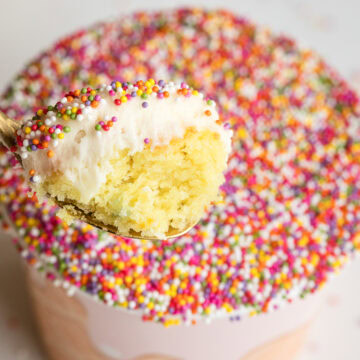 viral sprinkle cake cups like dot cakes with nonpareils spoonful showing a bite from inside.