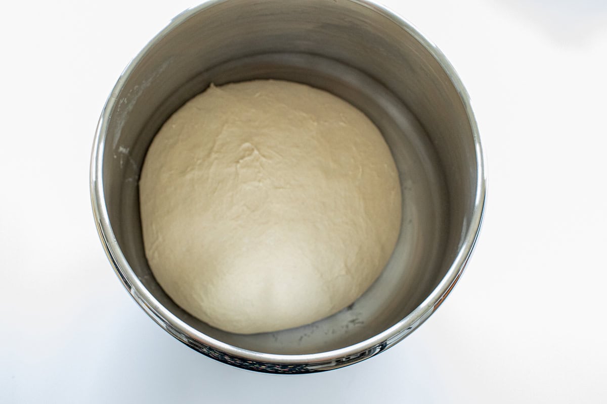 english muffins recipe in ankarsrum mixing bowl after an hour rise.