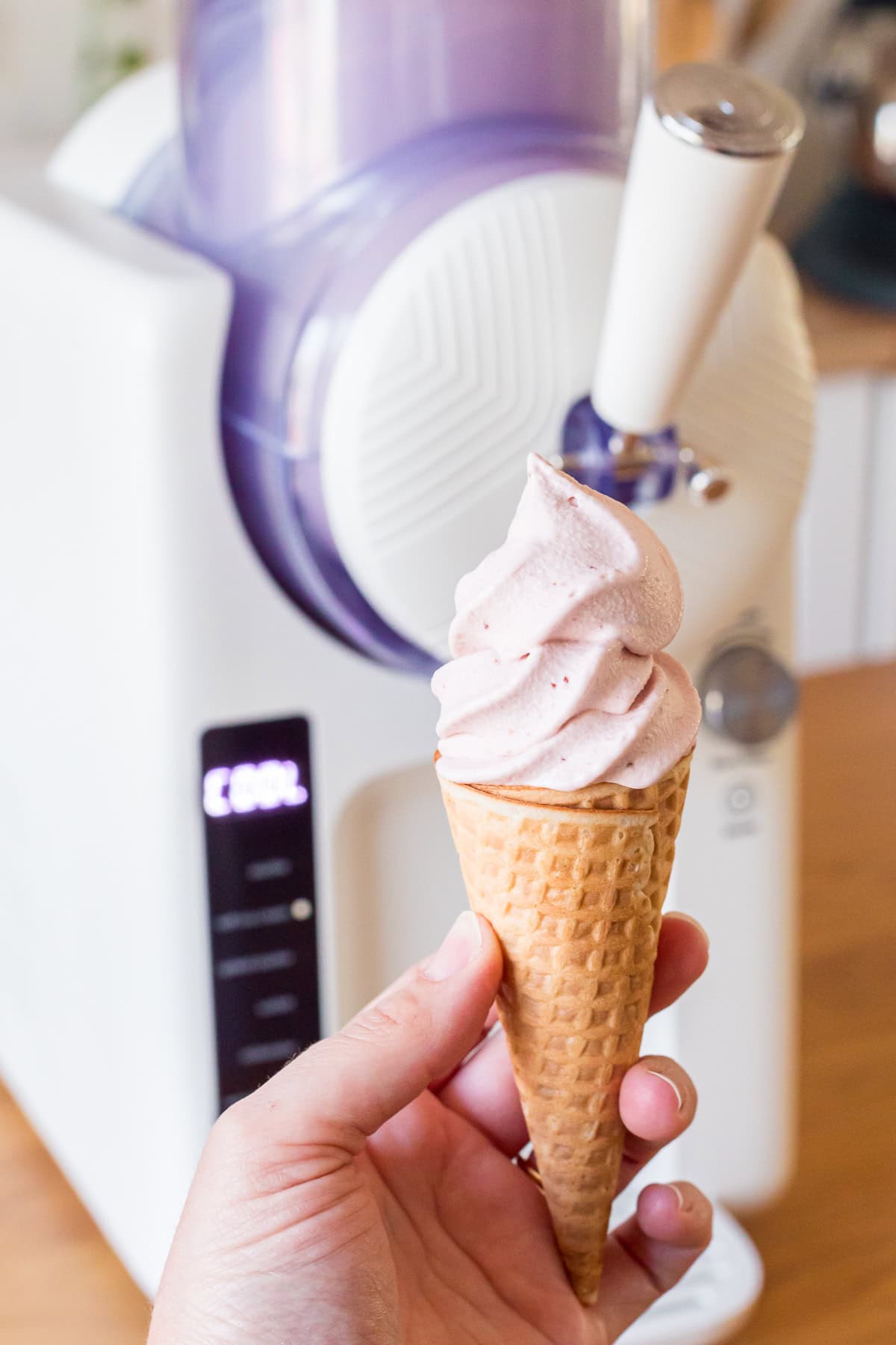 strawberry soft serve with greenpan frost in the background.