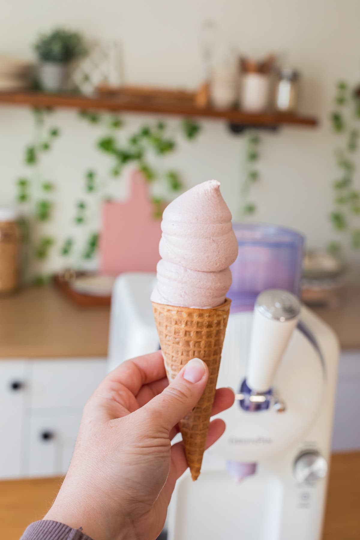 strawberry soft serve in a cone, made without pudding mix.
