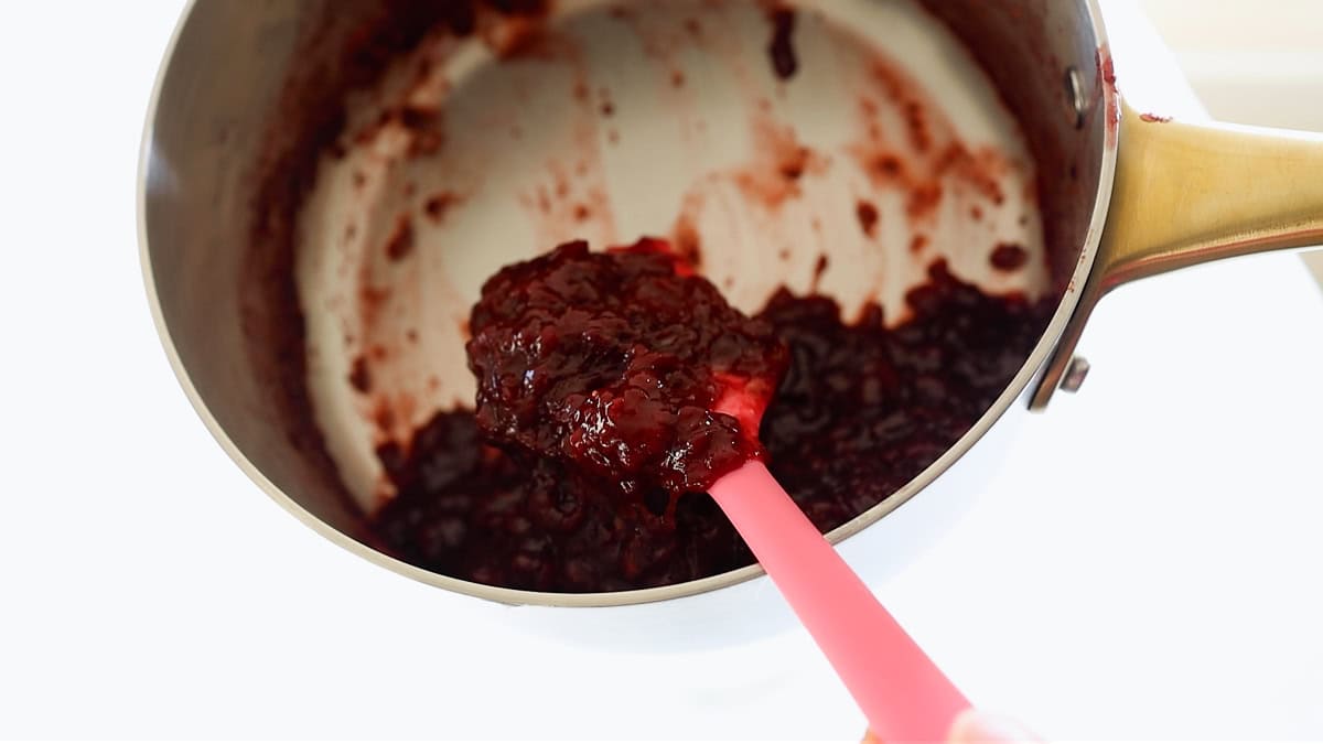 reduced strawberries and sugar in saucepan.