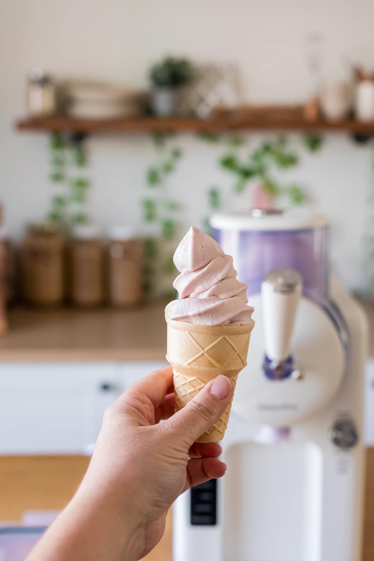 homemade strawberry soft serve with greenpan frost in the background.